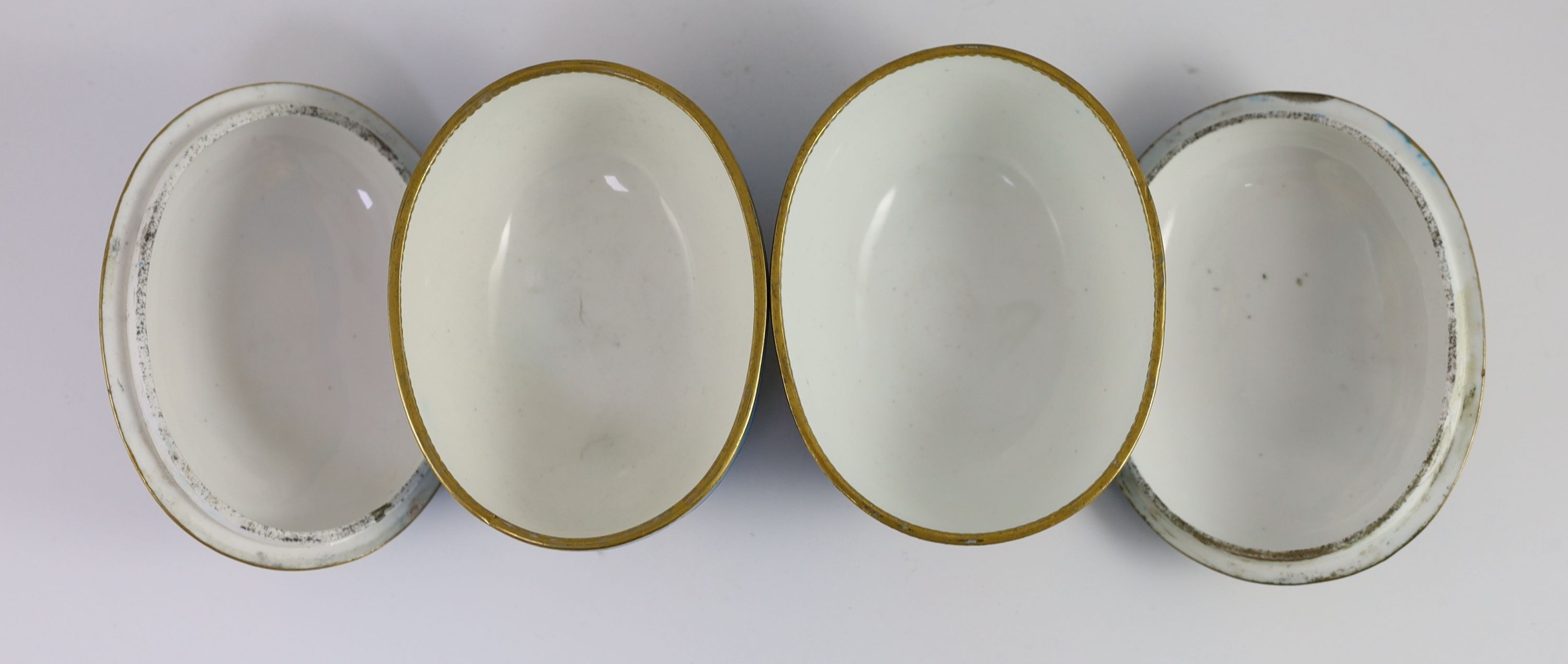 A pair of Sevres bleu celeste ecuelles and covers, c.1757–60, Length 15 cm, one cover restored